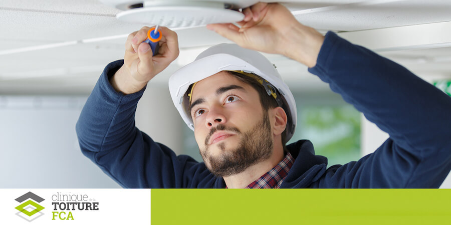 Worker checking the status of an alarm