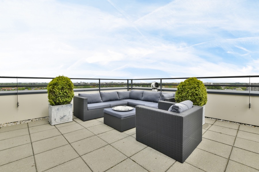 A roof terrace including guardrails for safety.